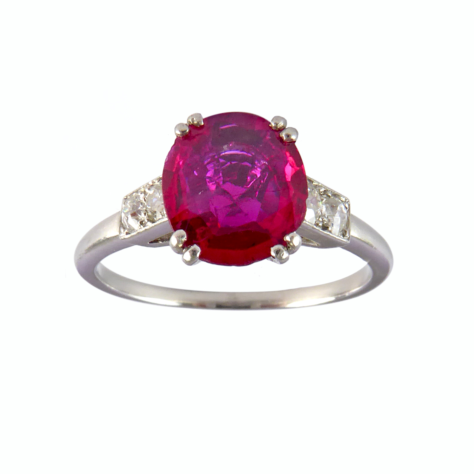Mid-20th century single stone ruby ring with diamond shoulders, c.1955